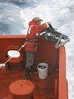 Skip Owen replaces an XBT probe on the ARSV LAURENCE M. GOULD.