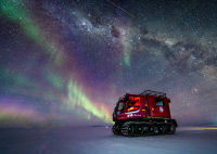 Auroras over a PistenBully. Photo by Jeff Capps.

