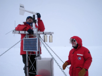 Matt Lazzara checks an Automatic Weather System. Photo by Matthew Lazzara. Image courtesy of NSF/USAP Photo Library.
