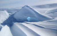 Snowdrift created by wind. Photo by Dan Pekol, NSF.
